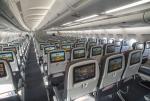 Passenger seats with TVs at the back in A330 Economy Cabin